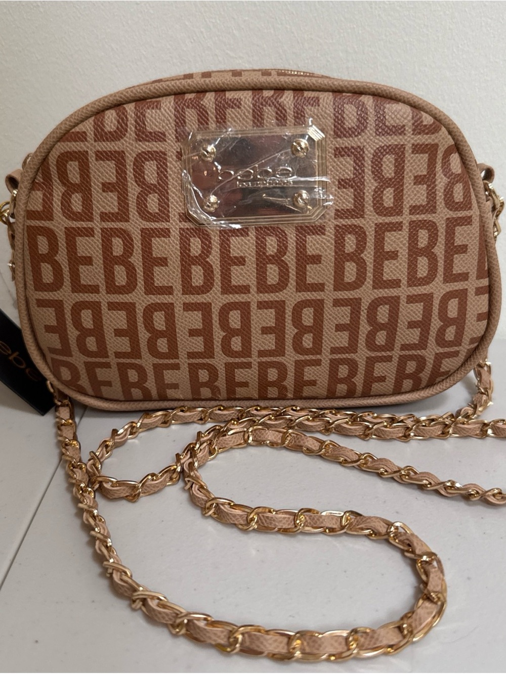 bebe Monogram Crossbody Bag in Tan with Gold Chain